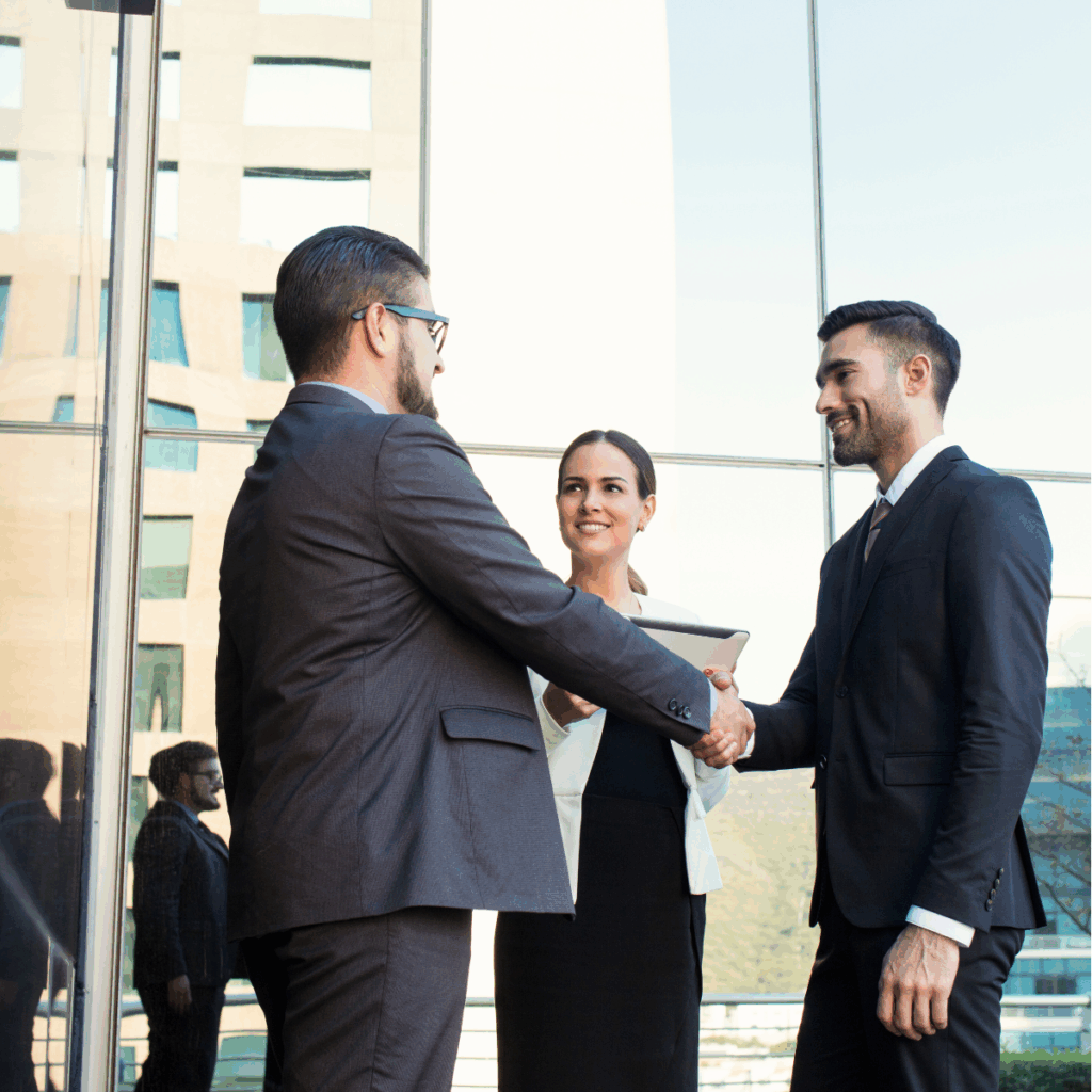 Business partners meeting at an international trade fair, building trust and long-term cooperation